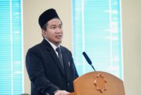 Dr. Muhammad Faizar H. M. Pd saat menyampaikan hasil disertasinya dalam ujian terbuka Program Doktor Psikolog Pendidikan Islam UMY