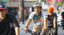 Foto Wakil Rektor UMY bidang Reputasi, Kemitraan, dan Digital saat mengikuti kegiatan PIKBIKE PITAKOM dalam rangkaian Munas VII APTIKOM DIY